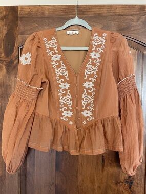 Listicle Rust Embroidered Peplum Blouse
